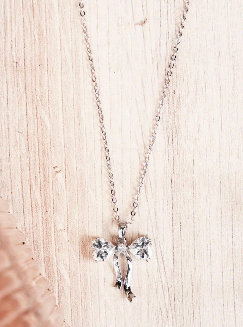 silver heart bow necklace
