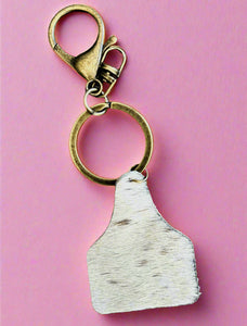 cow tag keychain, white with brown