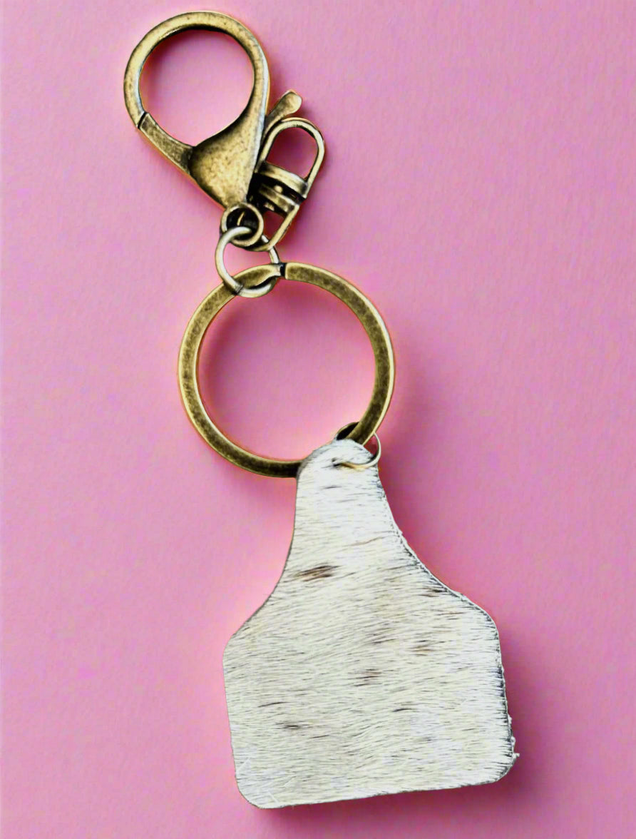 cow tag keychain, white with brown