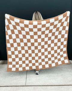 cloud print blanket, tan checkered