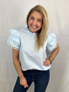 baby blue ruffle sleeve